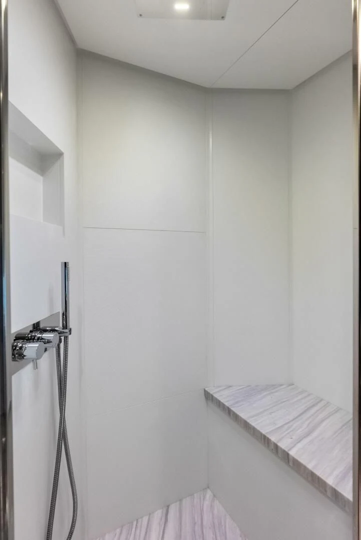 a shower unit with a standup shower aboard OUR TRADE Yacht for Sale