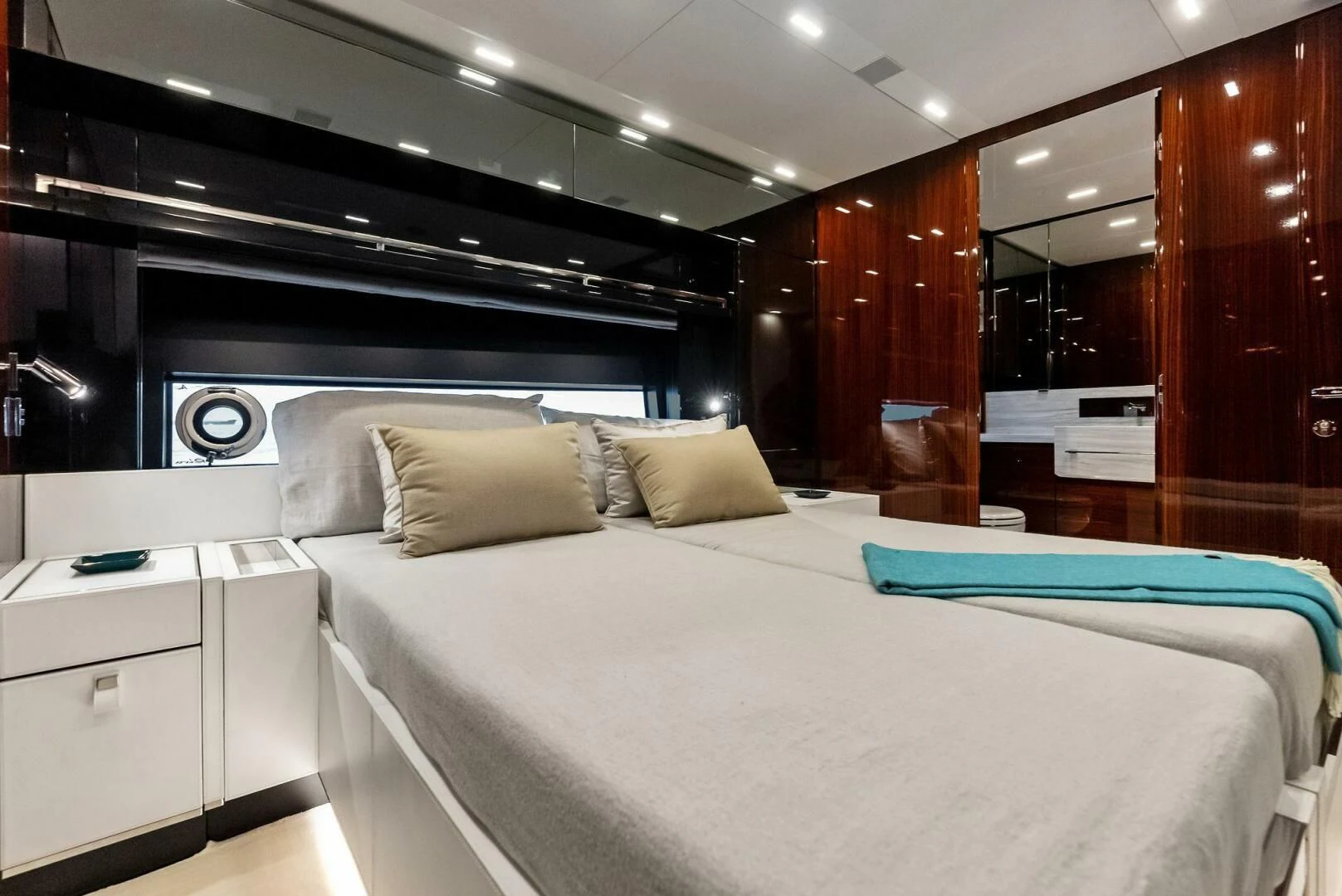 a room with a bed and a desk aboard OUR TRADE Yacht for Sale