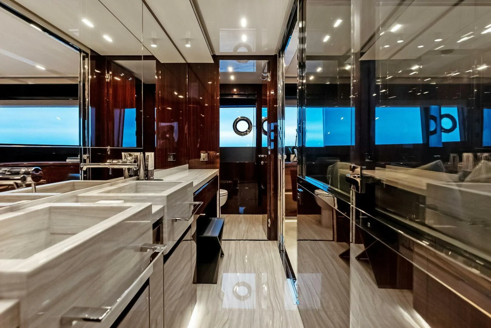 a large room with glass walls and a large display of computer screens aboard OUR TRADE Yacht for Sale