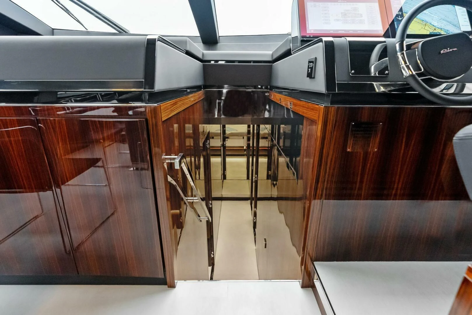 a kitchen with a large island aboard OUR TRADE Yacht for Sale