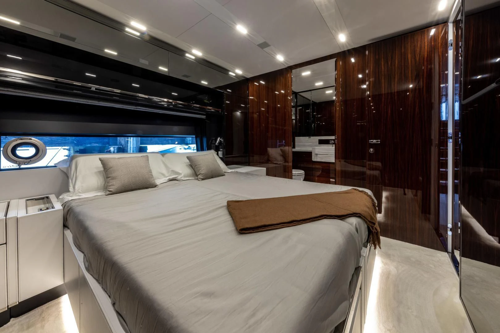 a room with a bed and a television aboard OUR TRADE Yacht for Sale