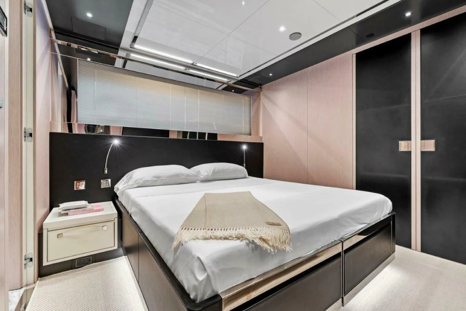a bed in a room aboard OUR TRADE Yacht for Sale