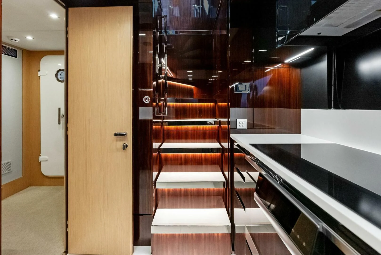 a door with a glass case aboard OUR TRADE Yacht for Sale