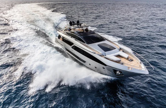a boat on the water aboard OUR TRADE Yacht for Sale