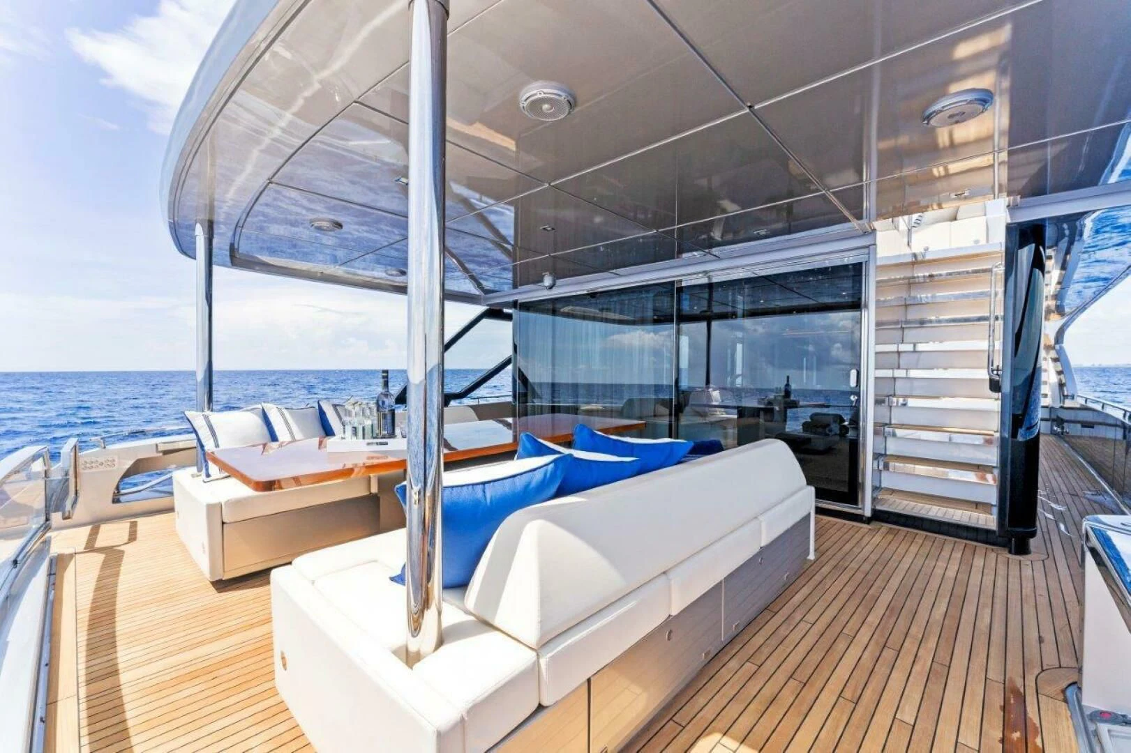 a room with a bed and a table aboard OUR TRADE Yacht for Sale