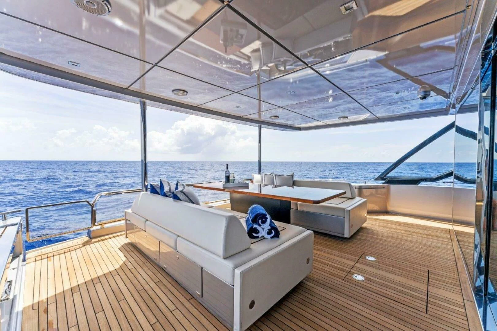 a room with a bed and a large body of water aboard OUR TRADE Yacht for Sale