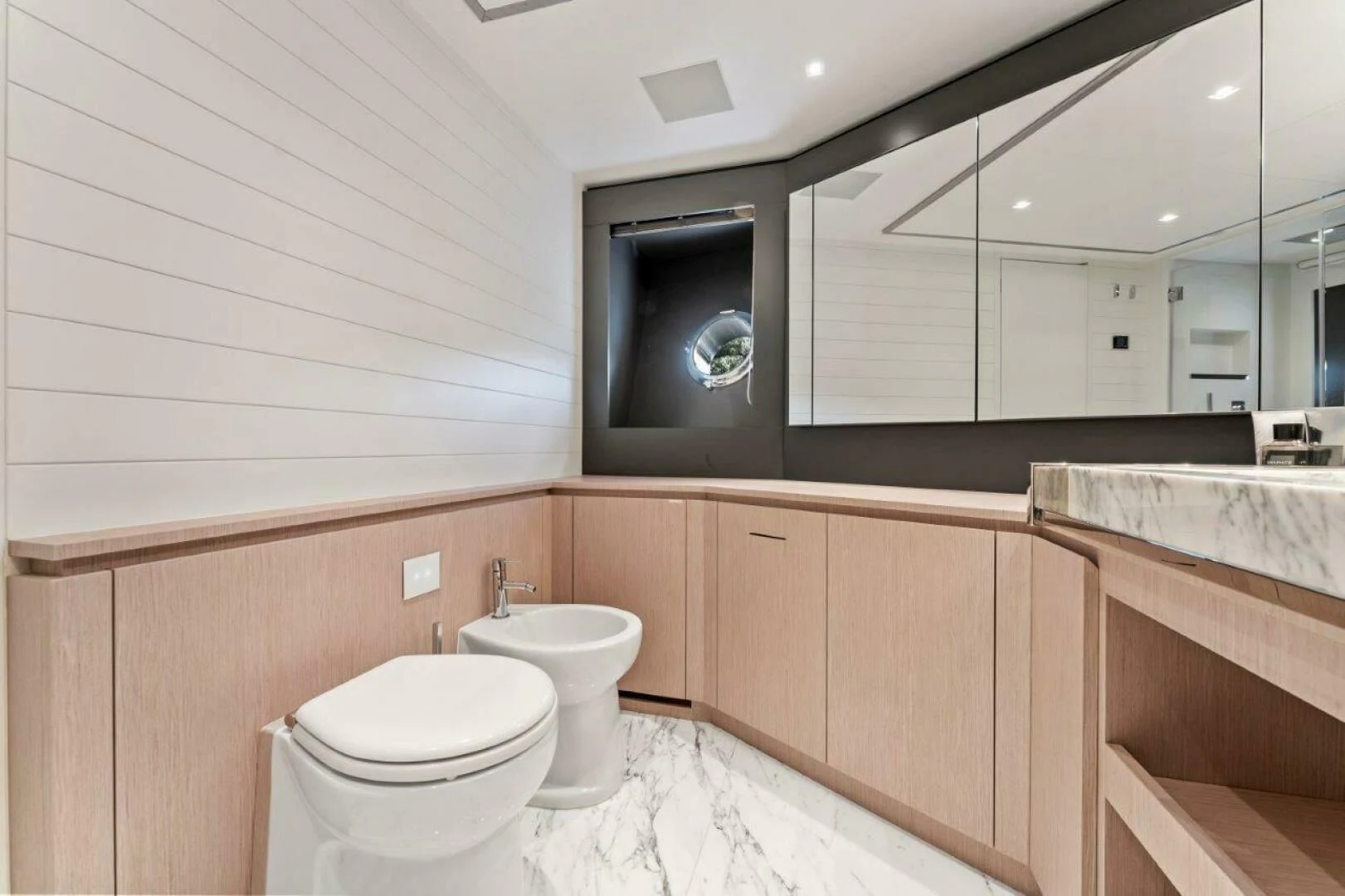 a bathroom with a couple of toilets aboard OUR TRADE Yacht for Sale
