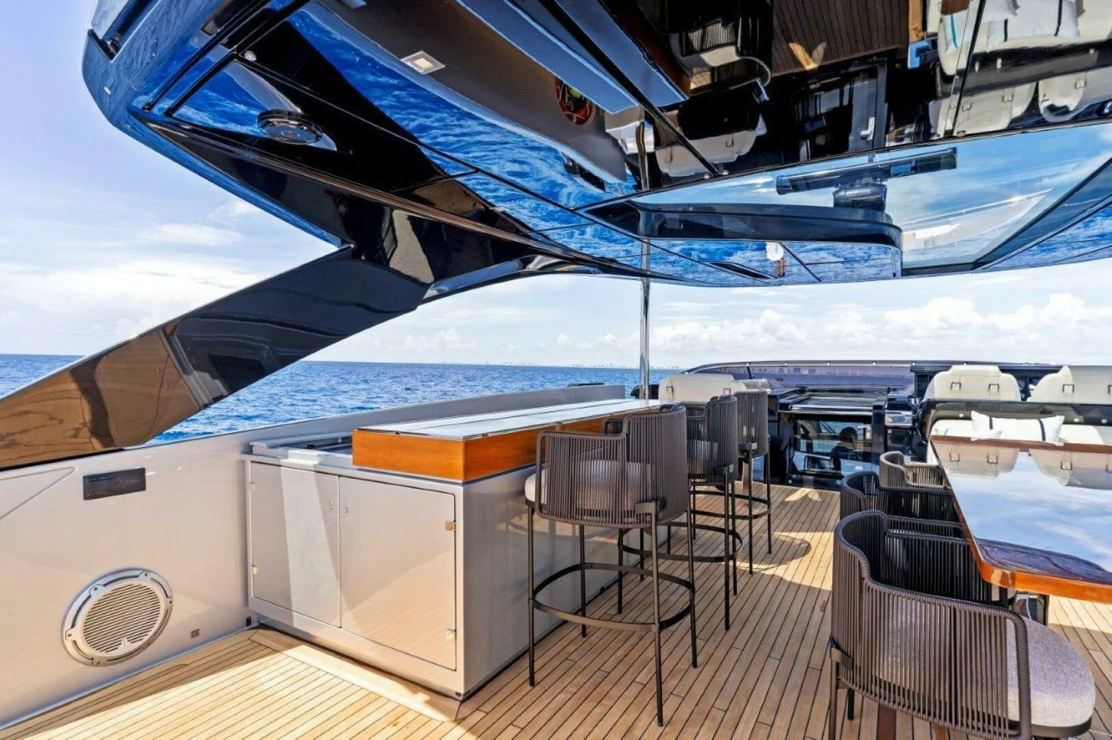 a large ship in a harbor aboard OUR TRADE Yacht for Sale