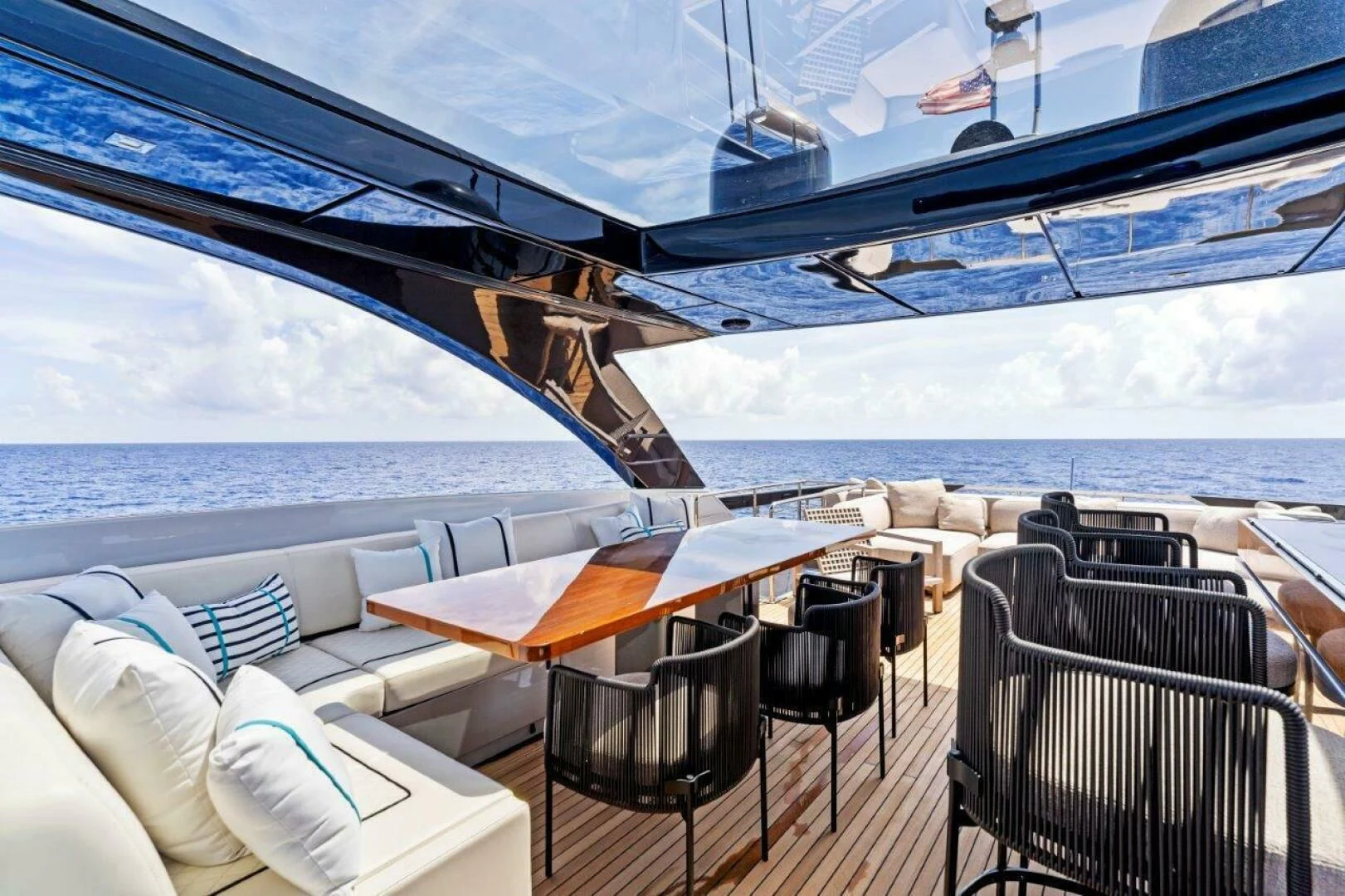 a room with a table and chairs aboard OUR TRADE Yacht for Sale