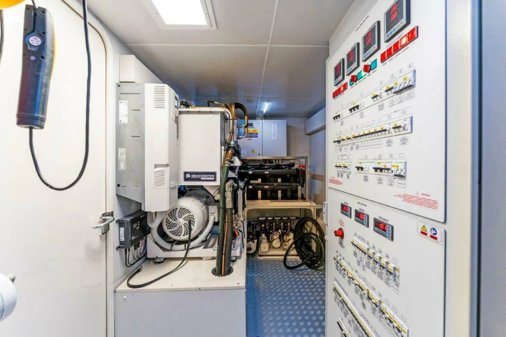 a room with machinery and equipment aboard OUR TRADE Yacht for Sale