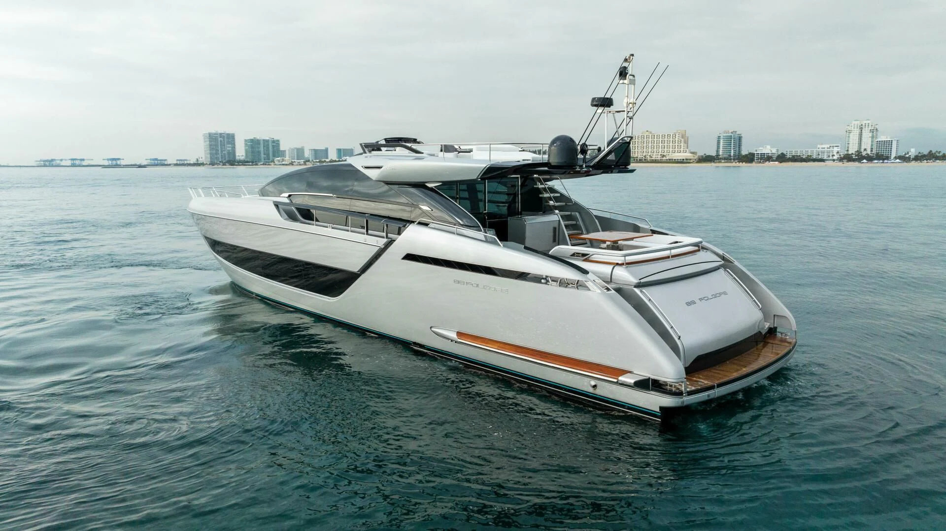 a white yacht on the water aboard OUR TRADE Yacht for Sale