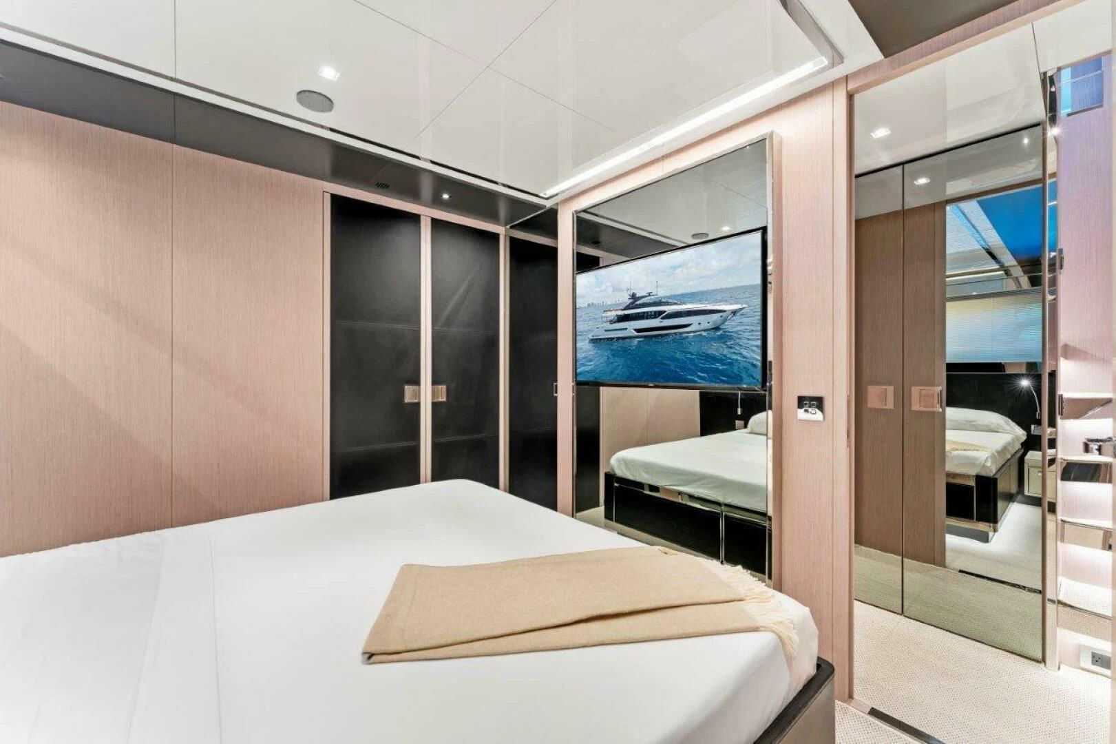 a room with a bed and a window aboard OUR TRADE Yacht for Sale