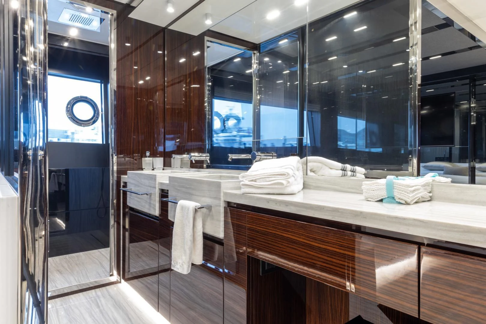 a bathroom with a large mirror aboard OUR TRADE Yacht for Sale