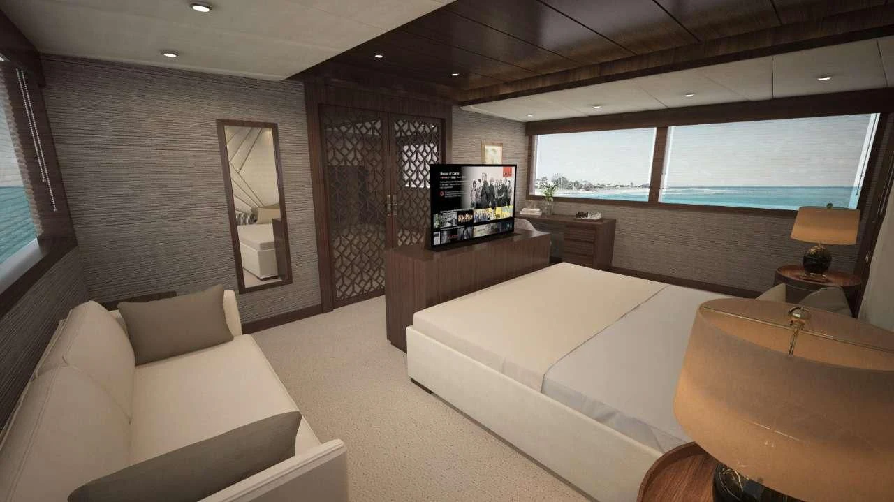 a room with a bed and a tv aboard GRAND MAJESTIC Yacht for Sale