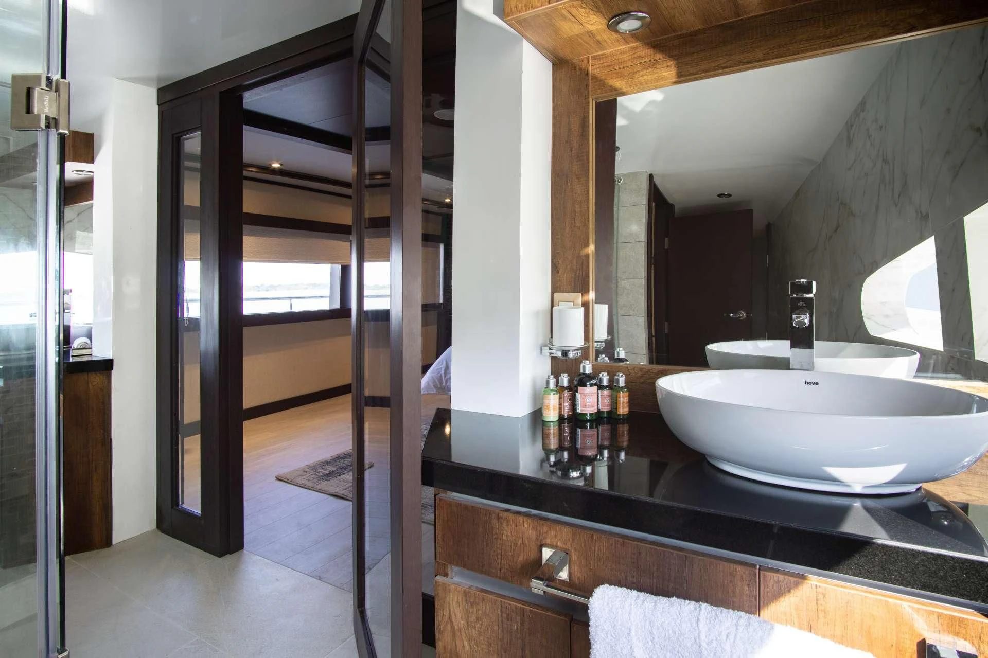 a bathroom with a sink and a mirror aboard GRAND MAJESTIC Yacht for Sale