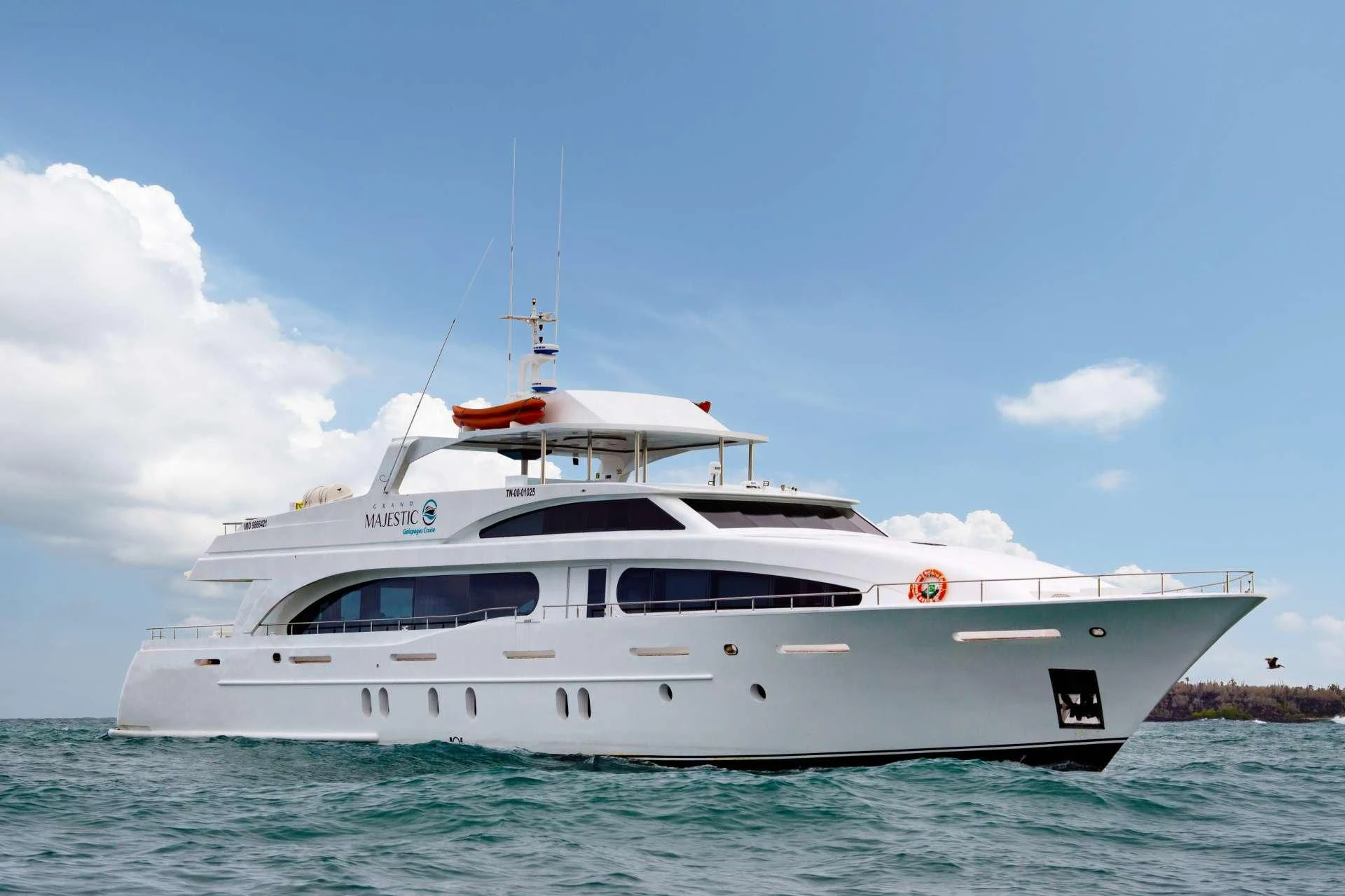 a white yacht in the water aboard GRAND MAJESTIC Yacht for Sale
