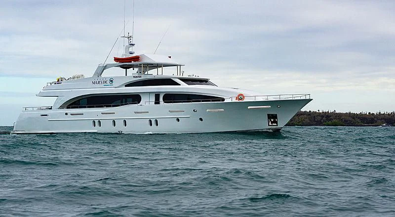 a white yacht in the water aboard GRAND MAJESTIC Yacht for Sale
