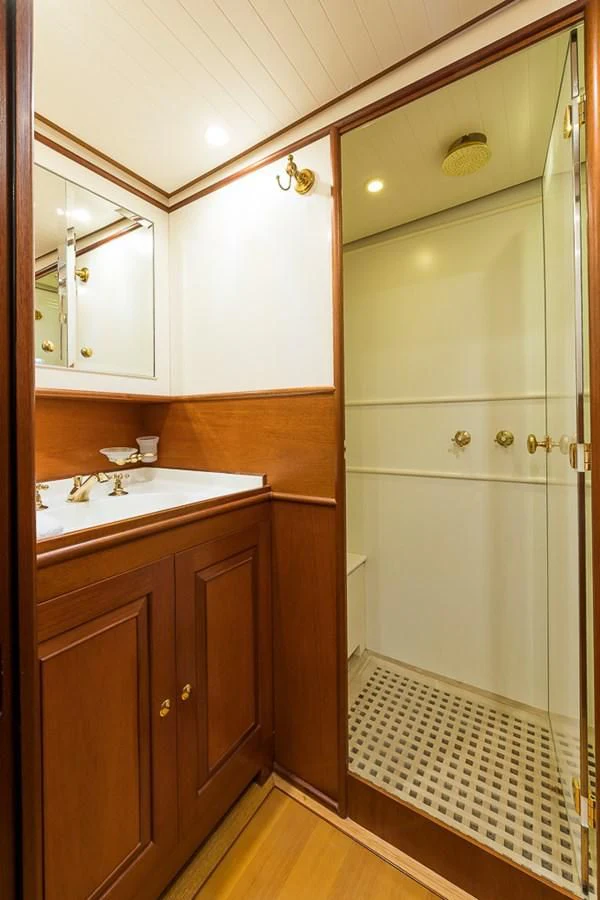 a bathroom with a glass shower aboard ALEXIA Yacht for Sale