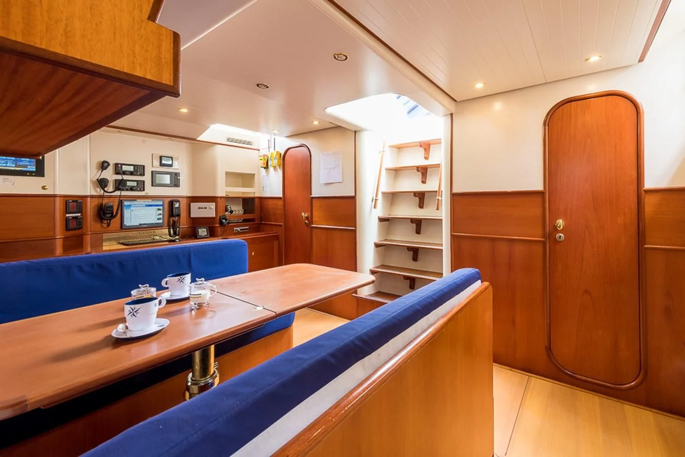 a room with a table and chairs aboard ALEXIA Yacht for Sale
