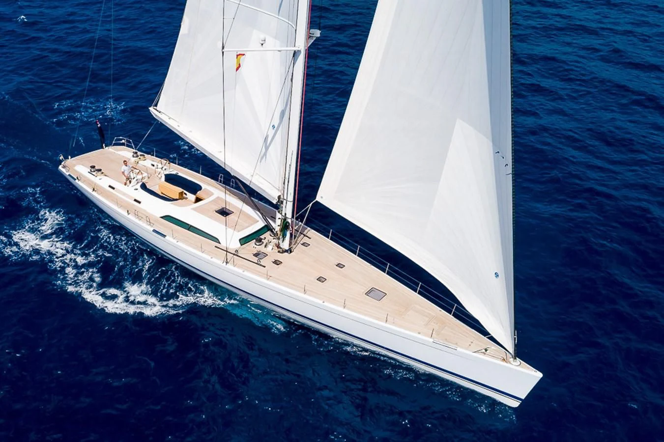 a white sailboat on the water aboard ALEXIA Yacht for Sale