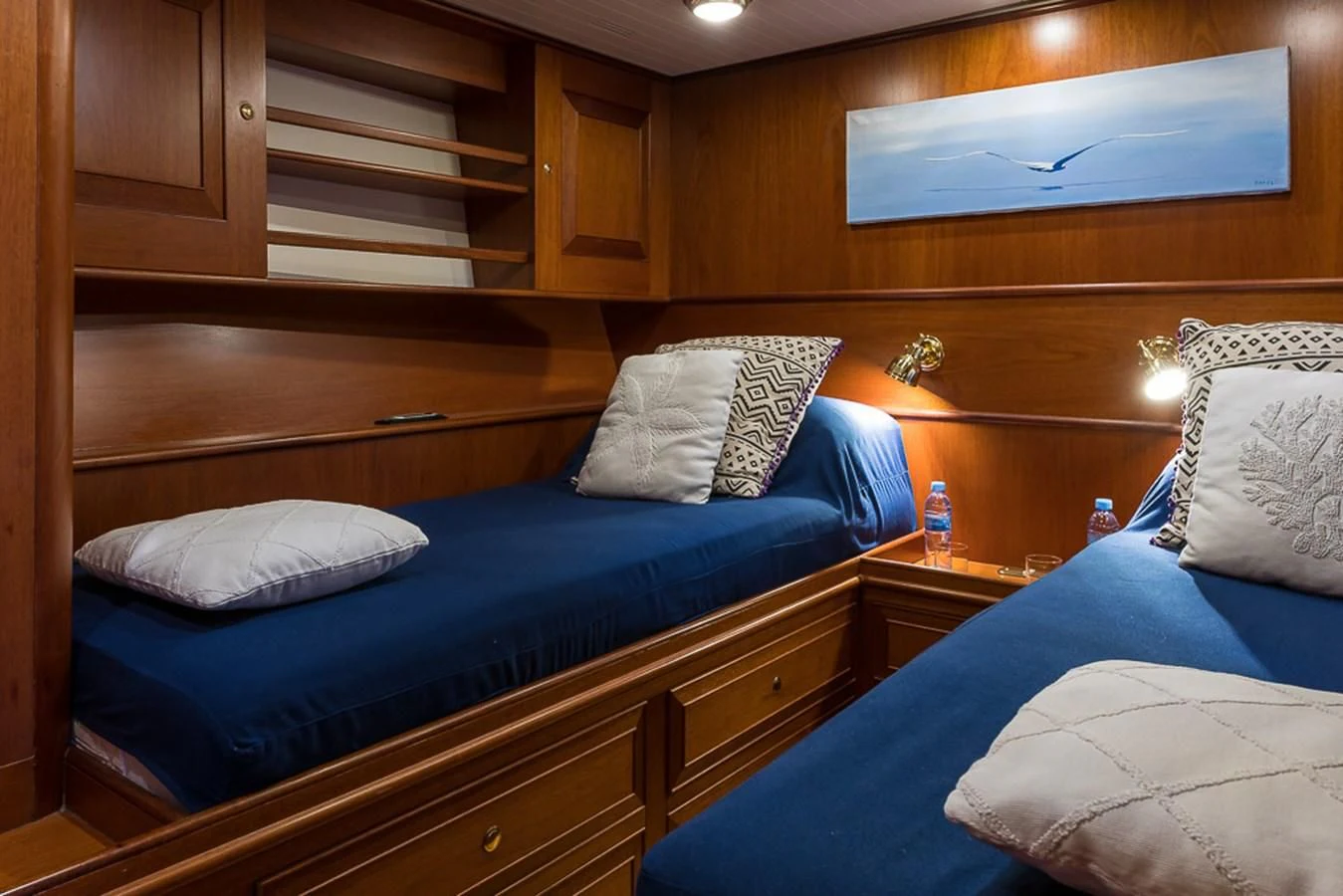 a room with wooden furniture aboard ALEXIA Yacht for Sale