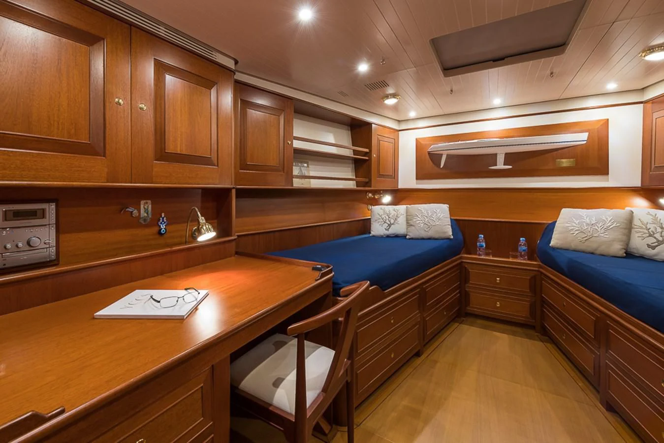 a kitchen with a table and chairs aboard ALEXIA Yacht for Sale