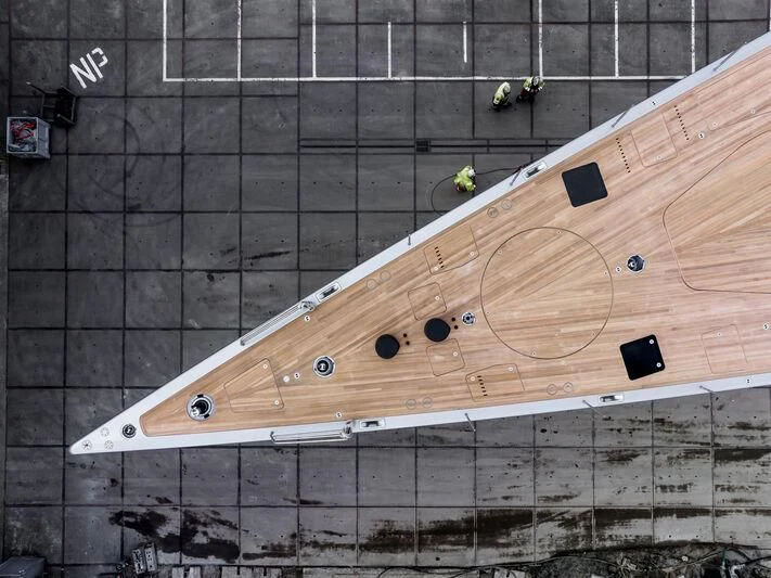 a wooden board with black and white text on it aboard SARISSA Yacht for Sale