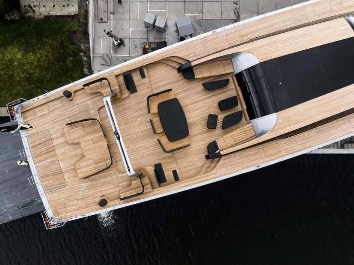 a wooden boat on a dock aboard SARISSA Yacht for Sale