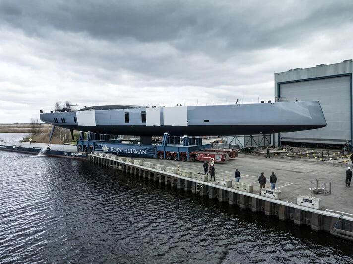 a large building with people walking on the side of it aboard SARISSA Yacht for Sale