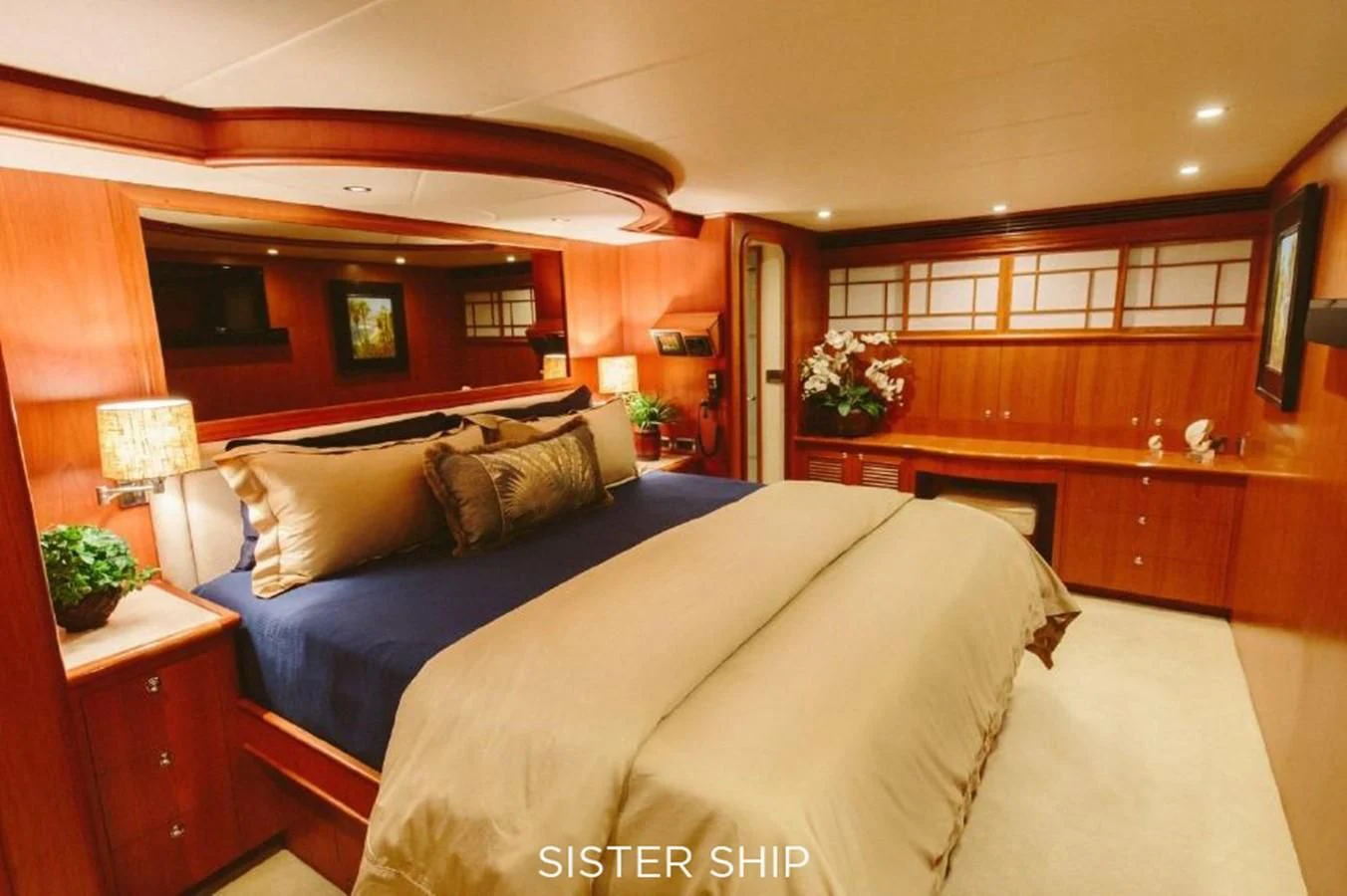 a bedroom with a large bed aboard 880 CPMY Yacht for Sale