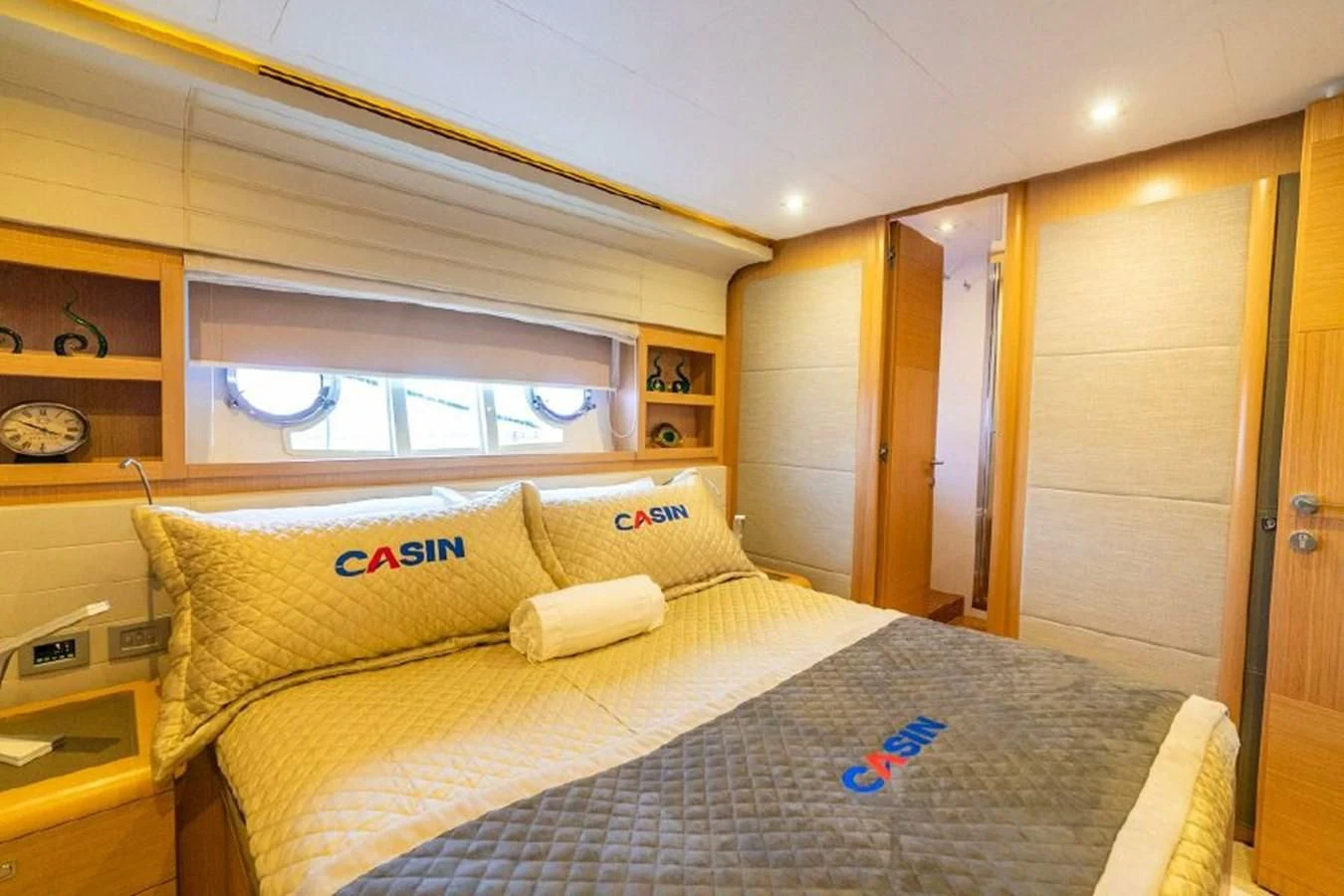 a bed in a room aboard FERRETTI Yacht for Sale