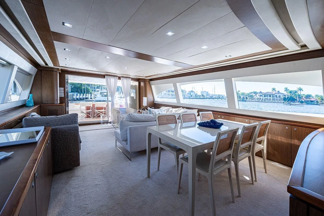 a large open kitchen and dining area aboard FERRETTI Yacht for Sale