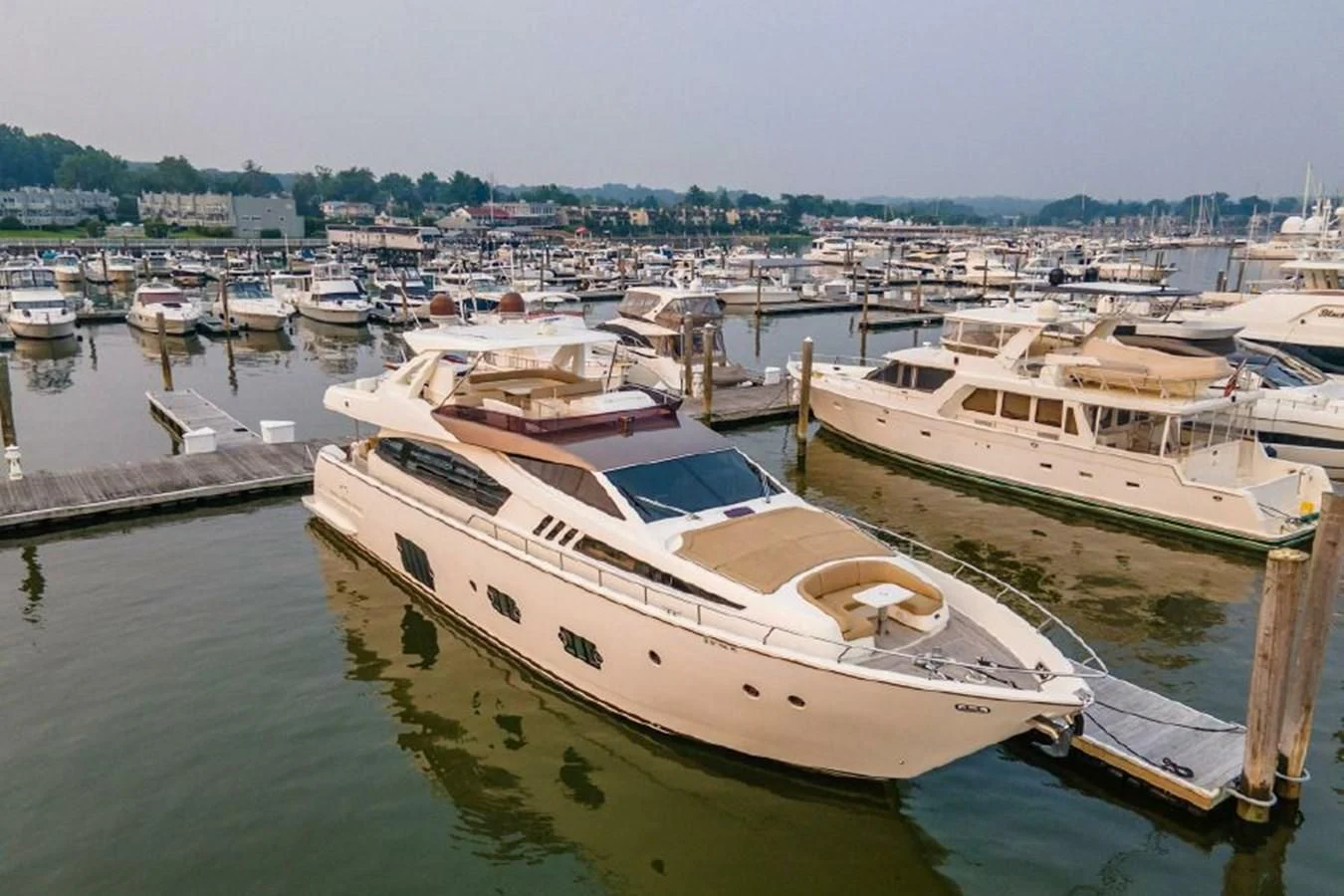 a group of boats are parked in a harbor aboard FERRETTI Yacht for Sale