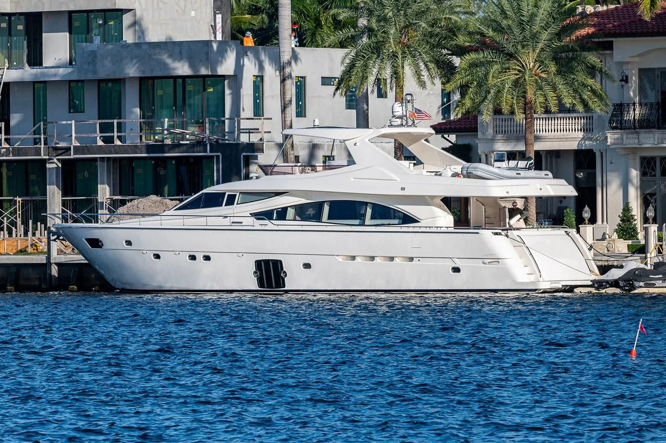 a white boat in a body of water aboard FERRETTI Yacht for Sale