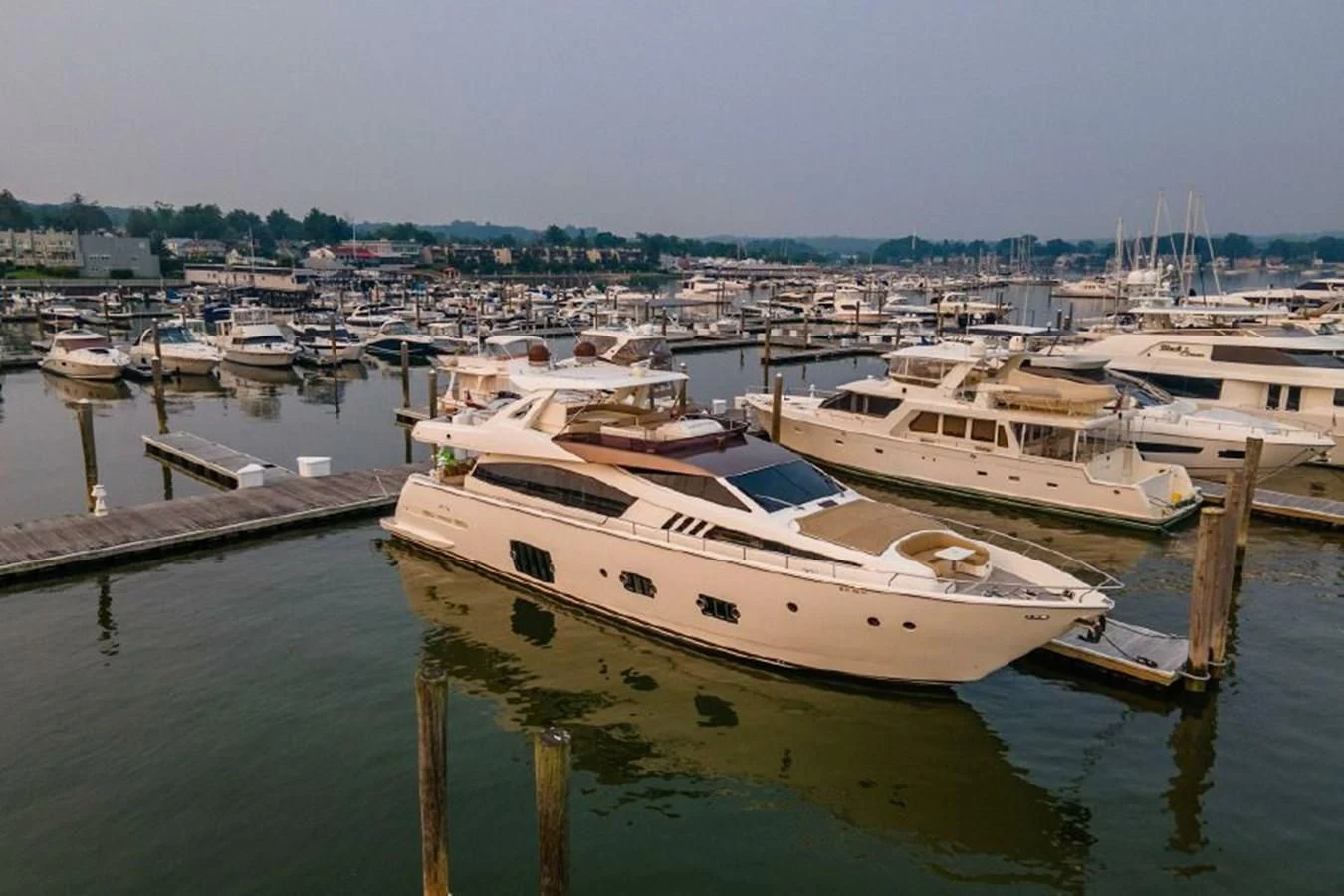 a group of boats are parked in a harbor aboard FERRETTI Yacht for Sale