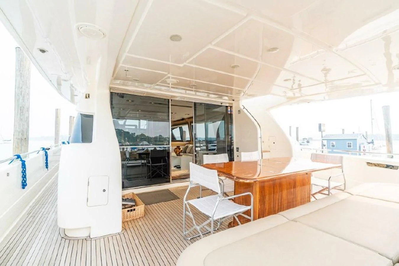 a room with a table and chairs aboard FERRETTI Yacht for Sale