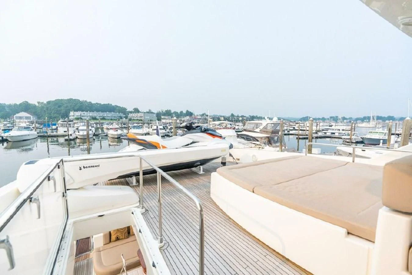a deck with boats on it aboard FERRETTI Yacht for Sale