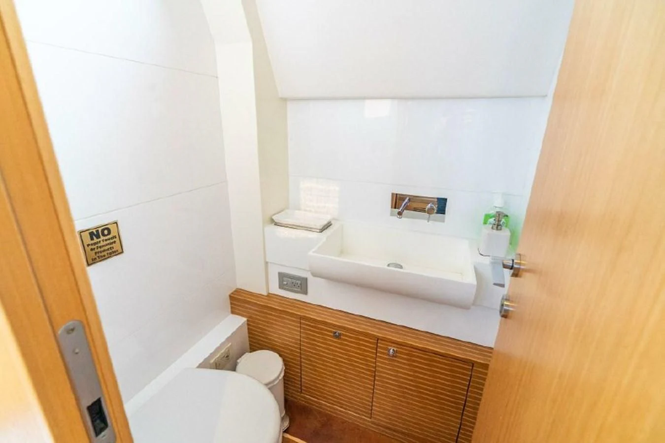 a bathroom with a sink toilet and a bathtub aboard FERRETTI Yacht for Sale