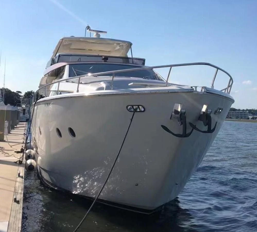 a white boat on the water aboard FERRETTI Yacht for Sale