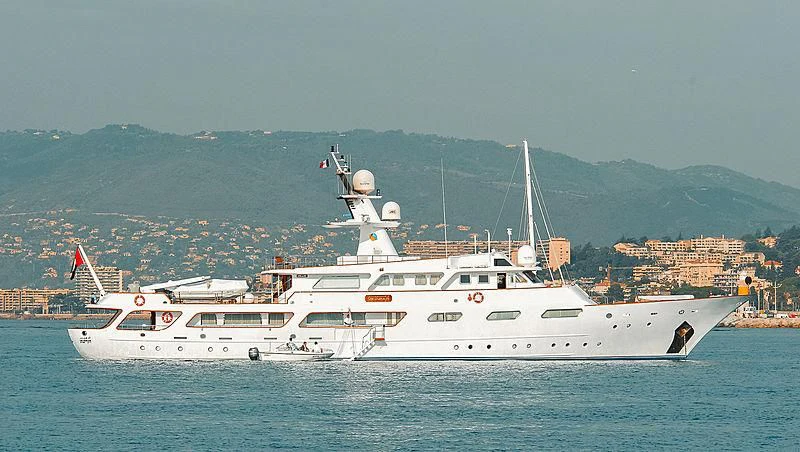 a couple of large white boats in the water aboard UM HURAIR Yacht for Sale