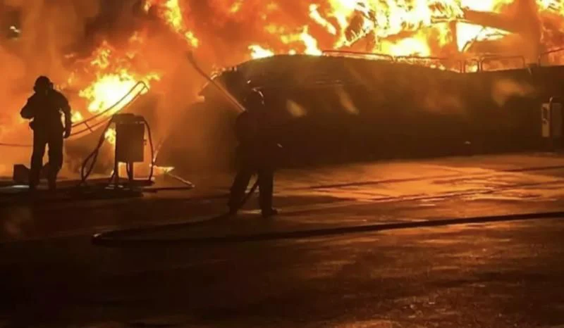 a group of people working on a fire aboard BLACK DIAMOND Yacht for Sale