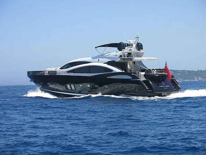 a boat on the water aboard BLACK DIAMOND Yacht for Sale