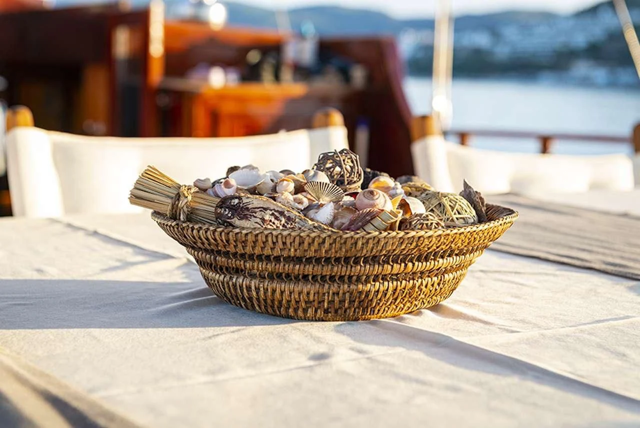 a basket of candy aboard QUEEN OF DATCA Yacht for Charter