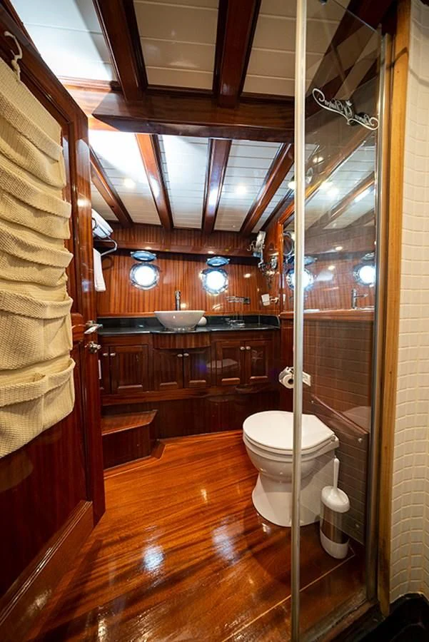 a bathroom with a glass shower aboard QUEEN OF DATCA Yacht for Charter