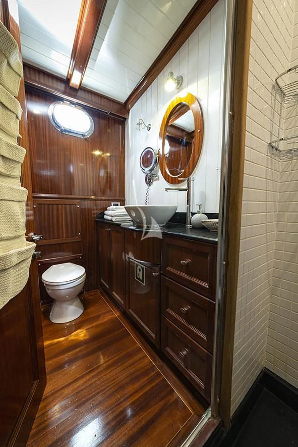 a bathroom with a sink and toilet aboard QUEEN OF DATCA Yacht for Charter