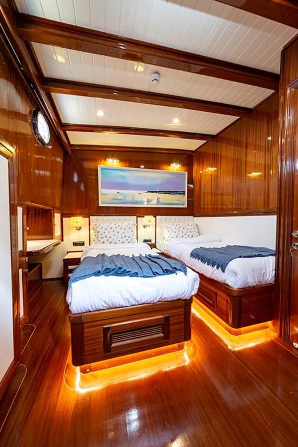 a room with two beds aboard QUEEN OF DATCA Yacht for Charter