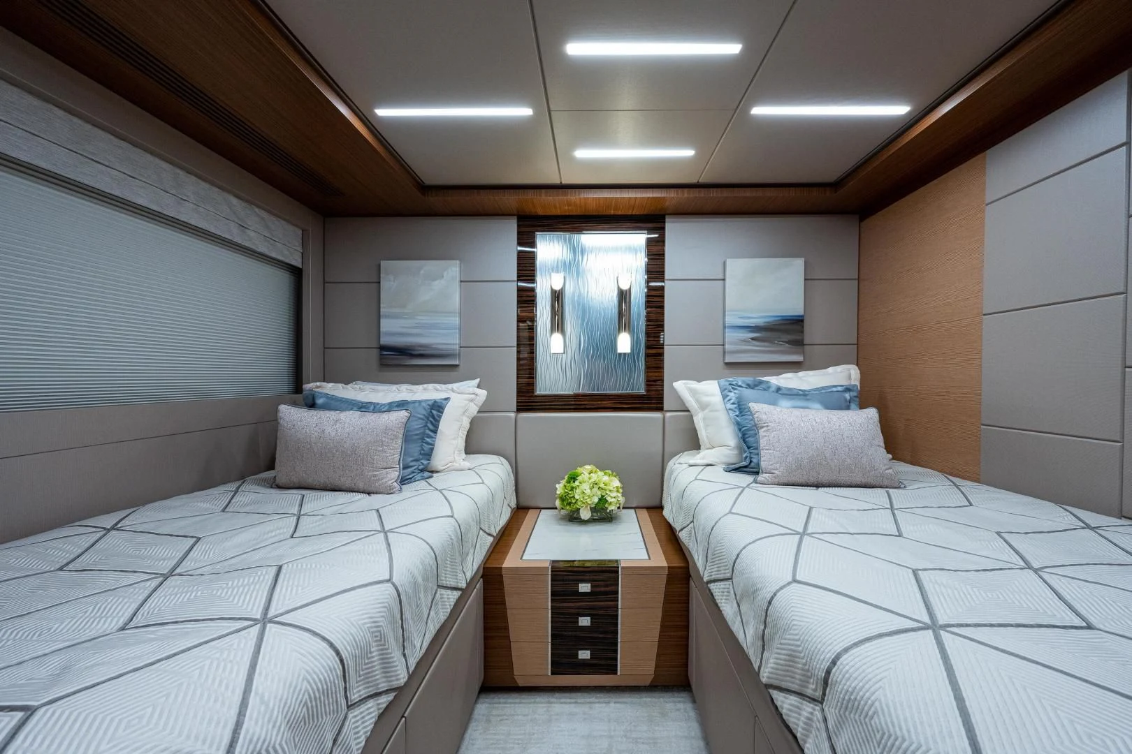 a room with two beds aboard SEASUITE Yacht for Charter