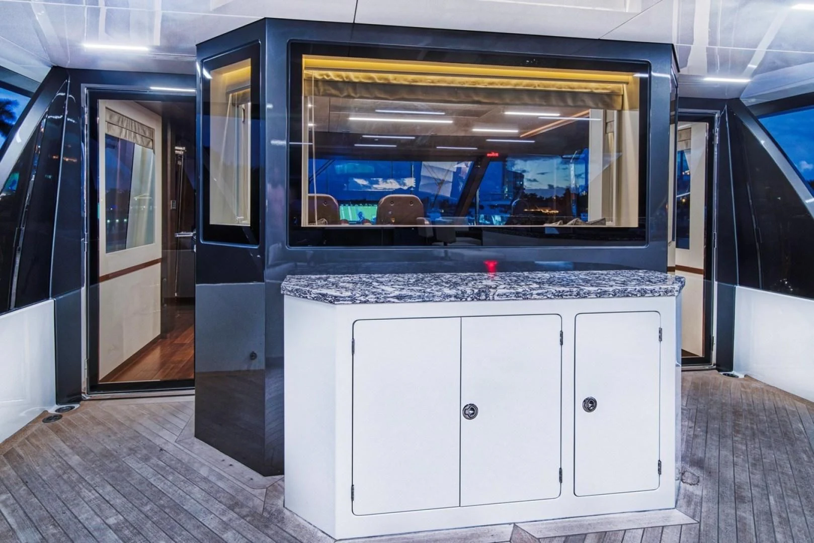 a room with a large window aboard SEASUITE Yacht for Charter