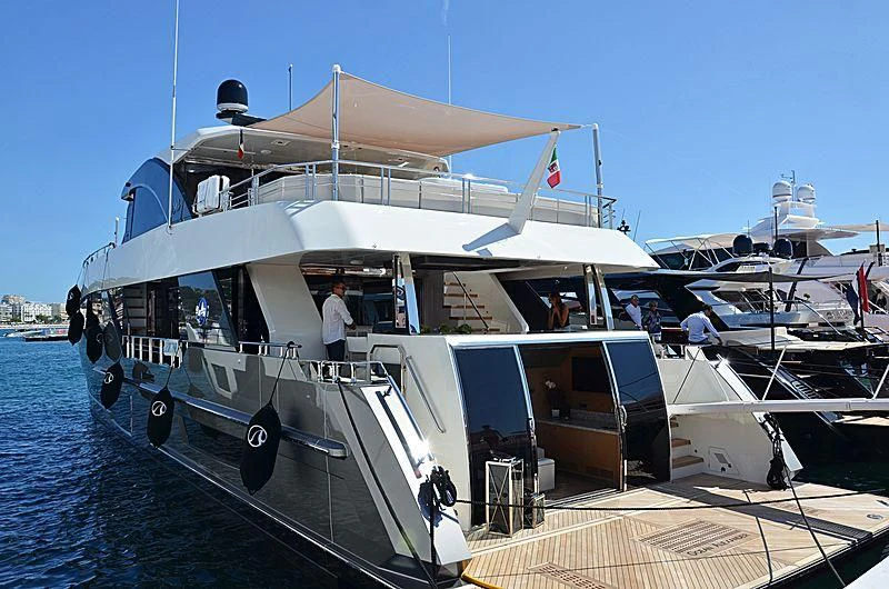 a boat with a canopy aboard SEASUITE Yacht for Charter