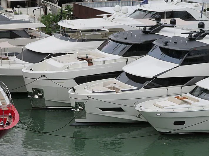 a group of boats parked in a harbor aboard SEASUITE Yacht for Charter